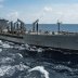 Military Sealift Command fleet replenishment oiler USNS Walter S. Diehl (T-AO 193) pulls alongside hospital ship USNS Mercy (T-AH 19) to deliver supplies and mail by a connected replenishment in the South China Sea August 15, 2016. Picture taken August 15