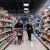 Shoppers browse in a supermarket while wearing masks to help slow the spread of coronavirus disease (COVID-19) in north St. Louis, Missouri, U.S. April 4, 2020. Picture taken April 4, 2020. REUTERS/Lawrence Bryant